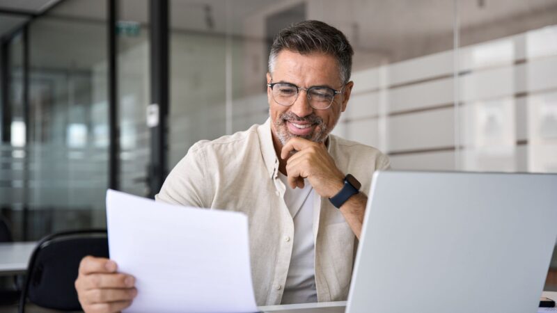 A man thinking about investing in online businesses through a self-directed IRA.