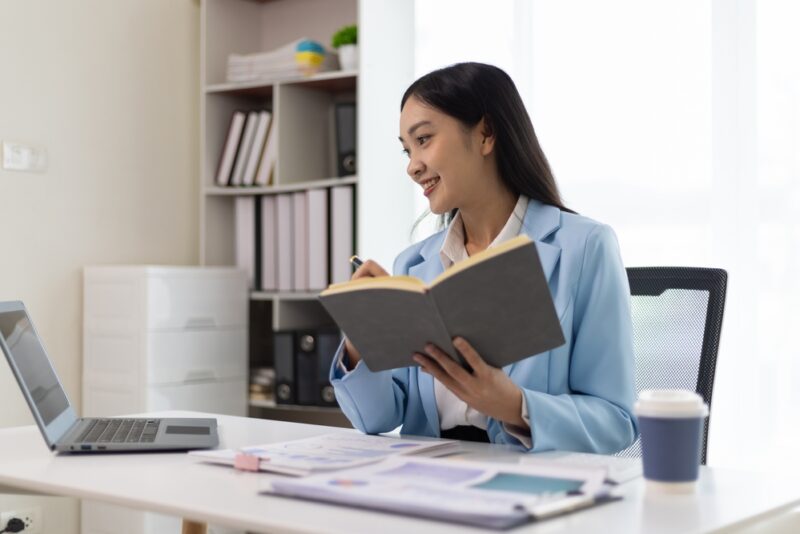 Woman going over the SaaS Due Diligence Checklist