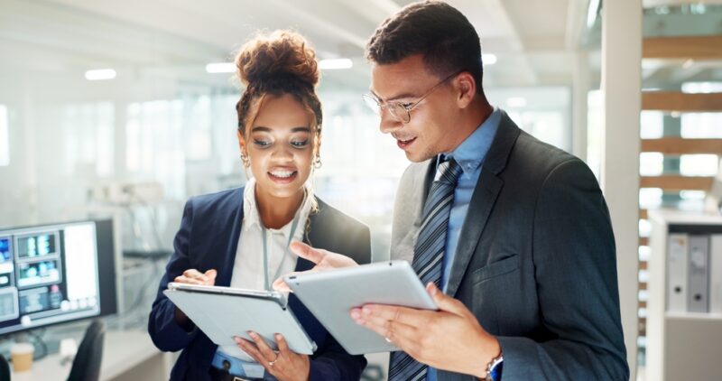 Man and woman analyzing the best passive income investments