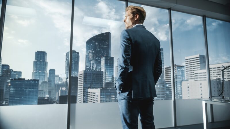 Businessman thinking about the alternative investment outlook for the future