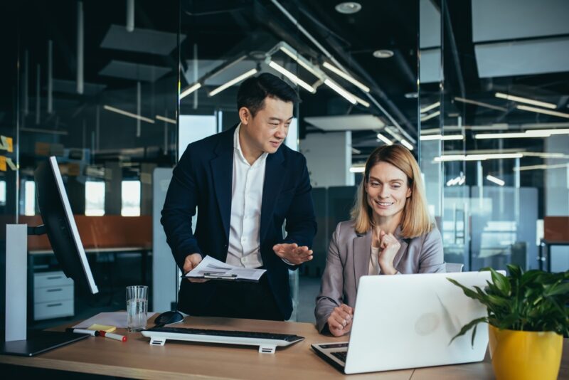 Business partners discussing SaaS acquisition strategies