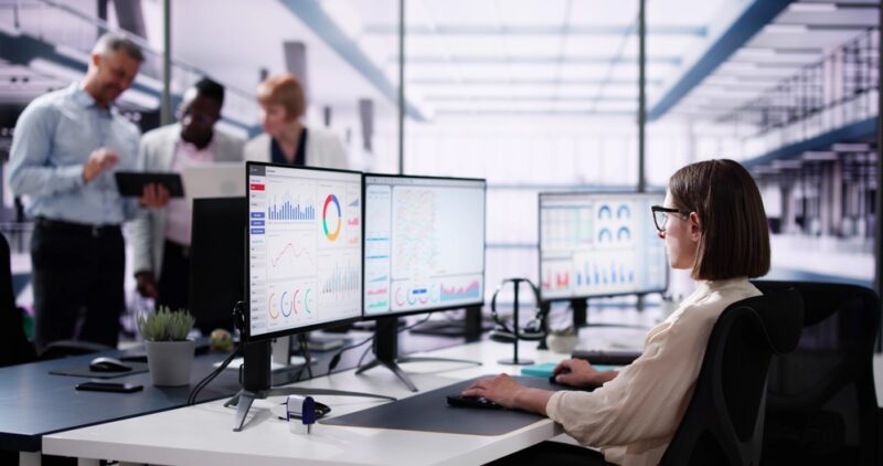 Woman performing due diligence before buying a SaaS business