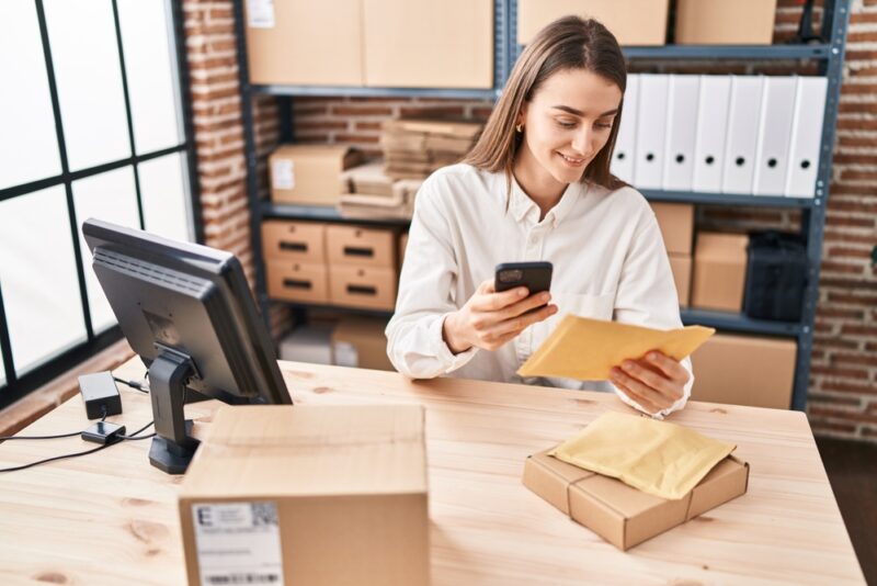 Woman thinking about the question "is ecommerce worth it"