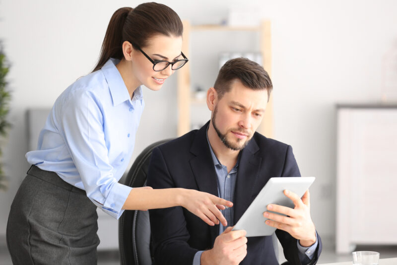 business partners discussing alternative investments