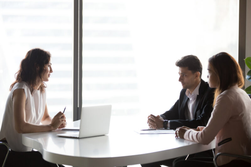 Businesswoman explaining how to get access to alternative investments