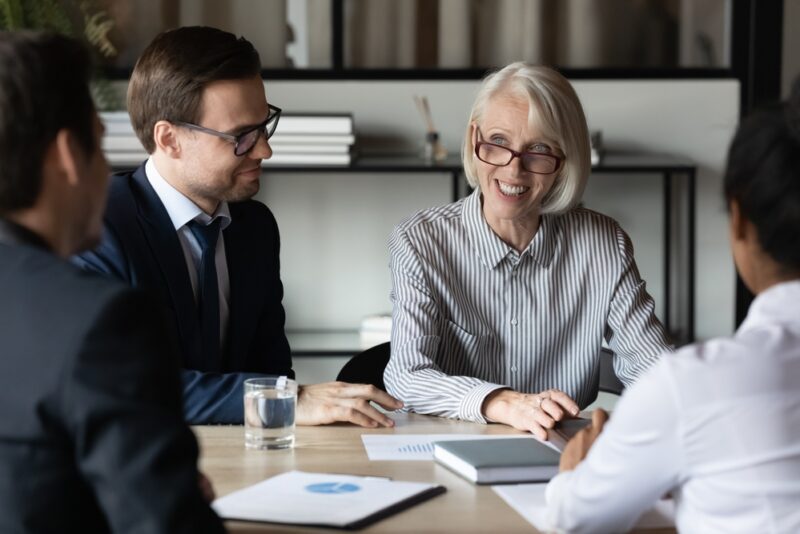 financial advisors discussing how to Invest in an Online Business